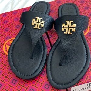 Lightly used navy blue Jolie flat thong sandal